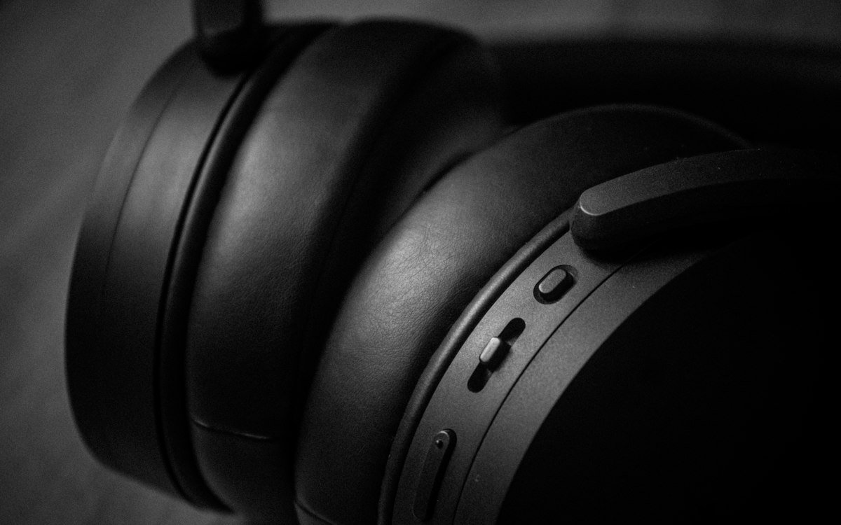 A close up of a black headphones